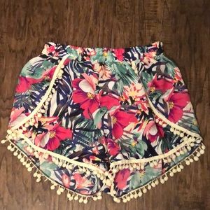 Multi-colored, tropical print shorts. Size Large.